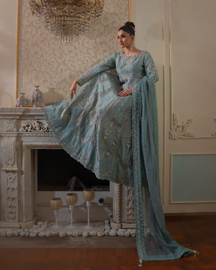 ice blue pishwas dress with embroidered dupatta and potli